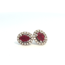Aretes Stud de Rubí con Halo de Diamantes en Oro Blanco